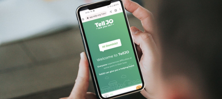 A mobile phone displaying the first page of the TellJO wellbeing check which delivers 1900% return on investment for businesses